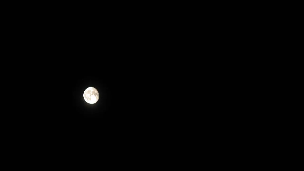 Peaceful Night With Full Moon Shining On A Dark Sky In Pradzonka Northern Poland Low-Angle Shot