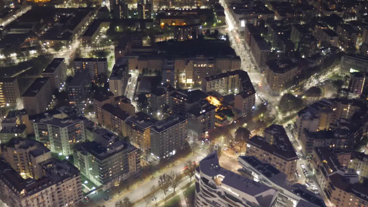 Cinematic time lapse high angle shot of Milan Streets Lights and passing cars