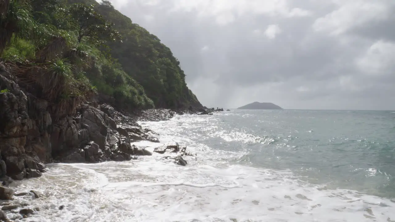 Rough Waves Hit On The Rocky Mountains In Bai Bang Beach In Con Dao Vietnam