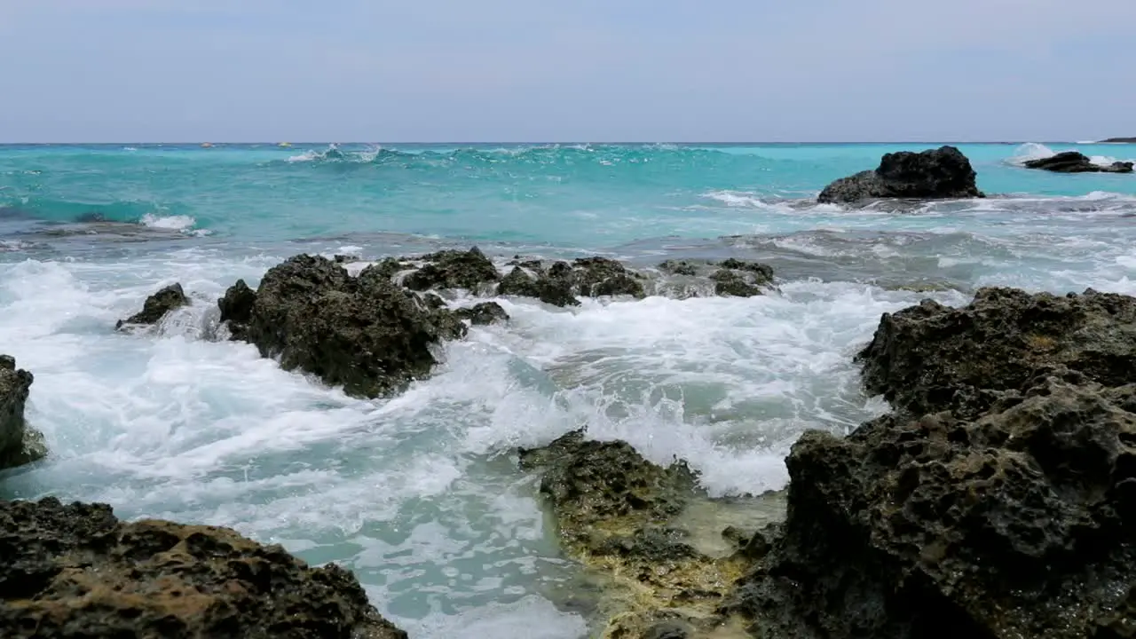 Sea waves crashing against the rocks