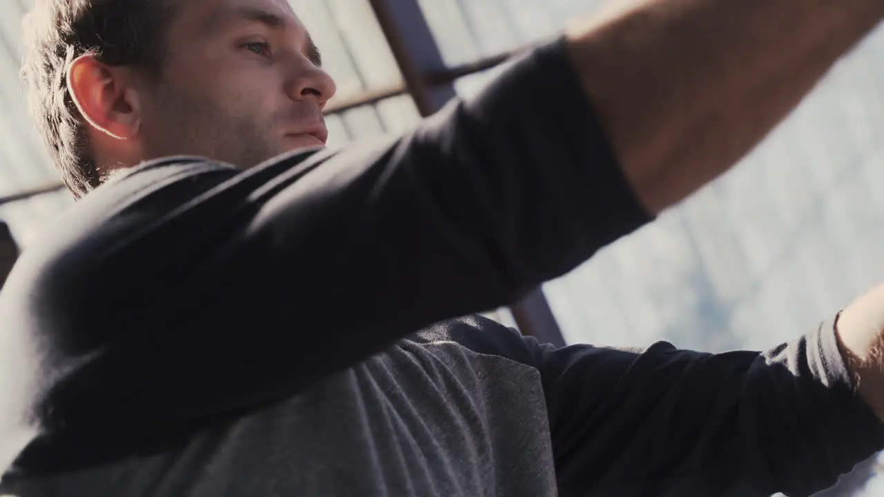 Close Up Of A Disabled Man In Wheelchair Working Out With Dumbbell At Home