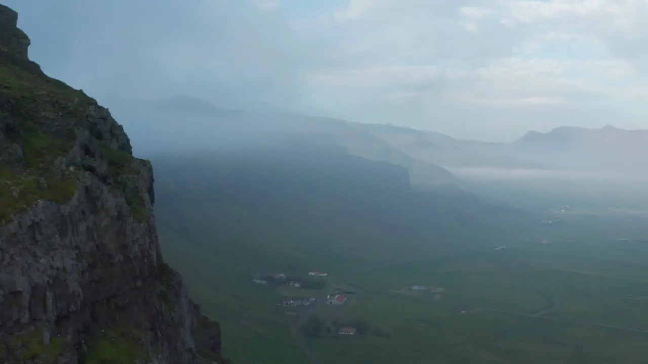 Drone view over moody foggy highlands in Iceland countryside Desolate and lonely misty panorama of nordic icelandic countryside