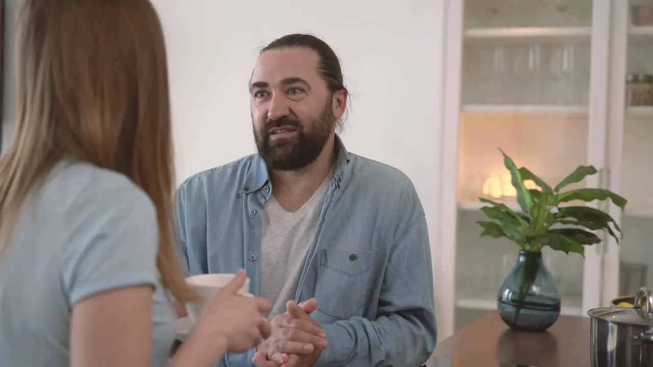 Bearded Man Has An Interesting Conversation With A Young Woman