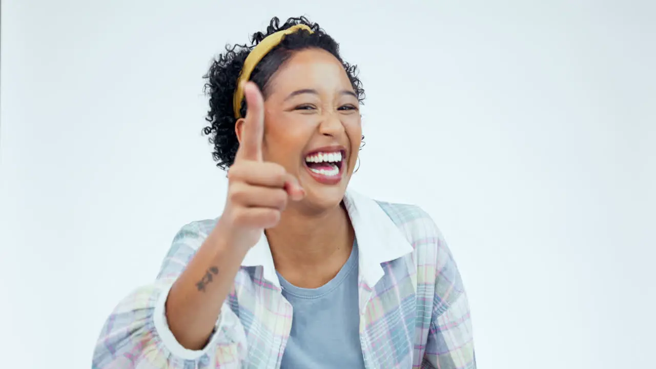 Happy woman face and no finger in studio for bad