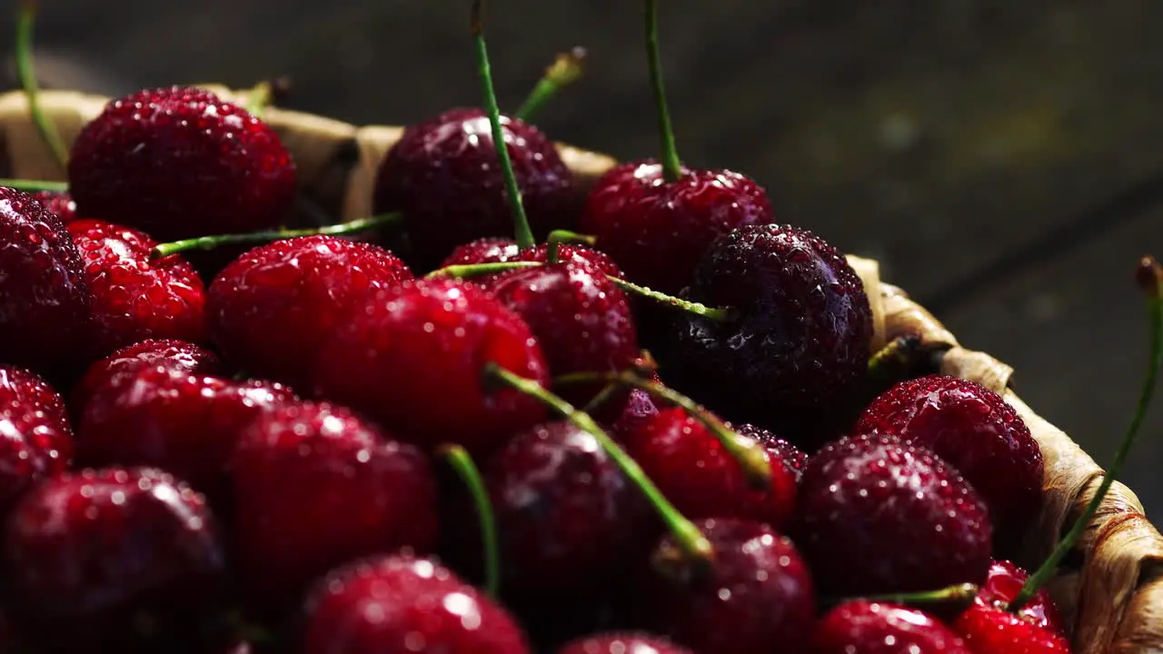 Fresh cherry with water drops on dark background Fresh cherries background Healthy food concept