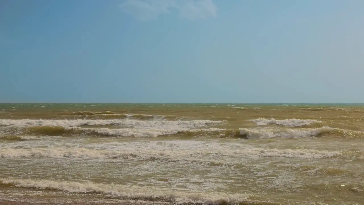 Empty beach waves of Calahonda Spain after a storm