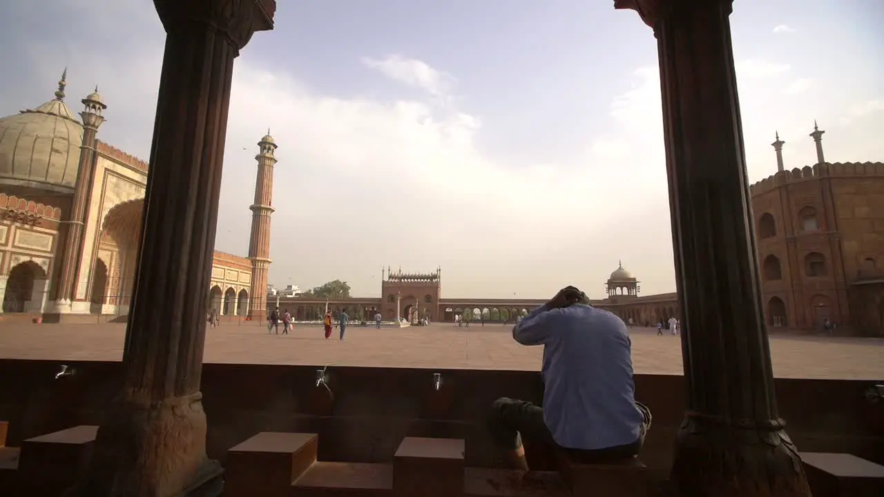 Man Washing in Jama Masjid