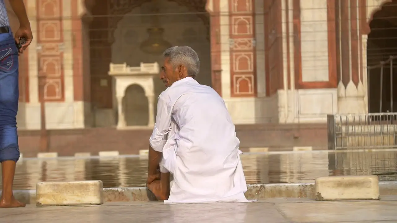 Man Cleaning at Indian Temple