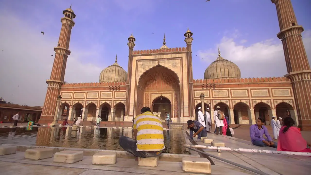 Worshippers Bathing at Jama Masjid Delhi India