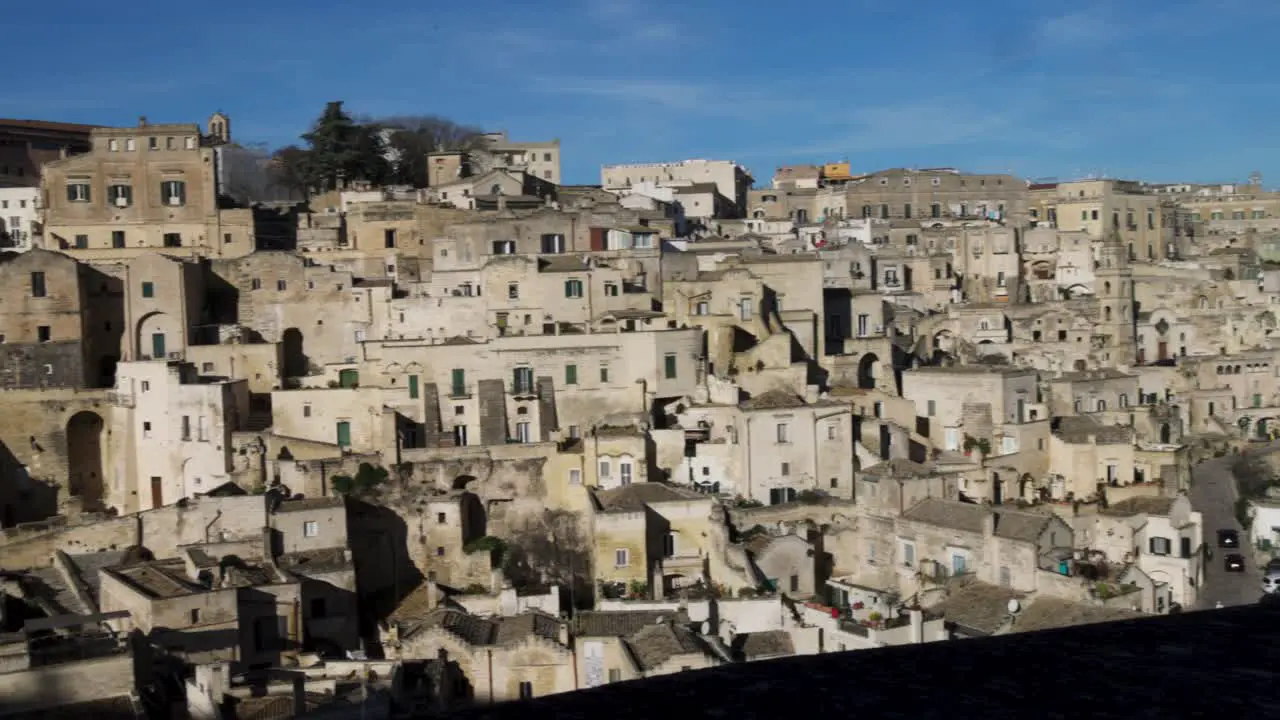 Matera Italy cityscape pan right to left