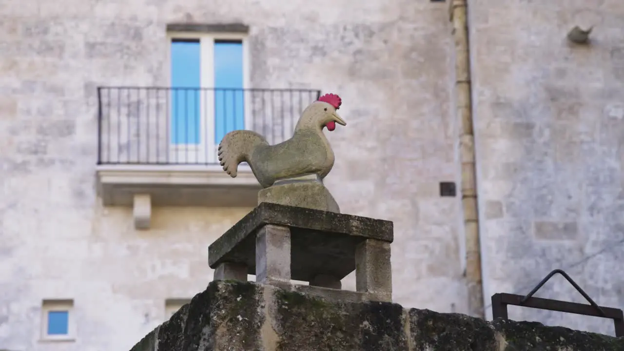 Matera Itlay rooster sculpture on porch