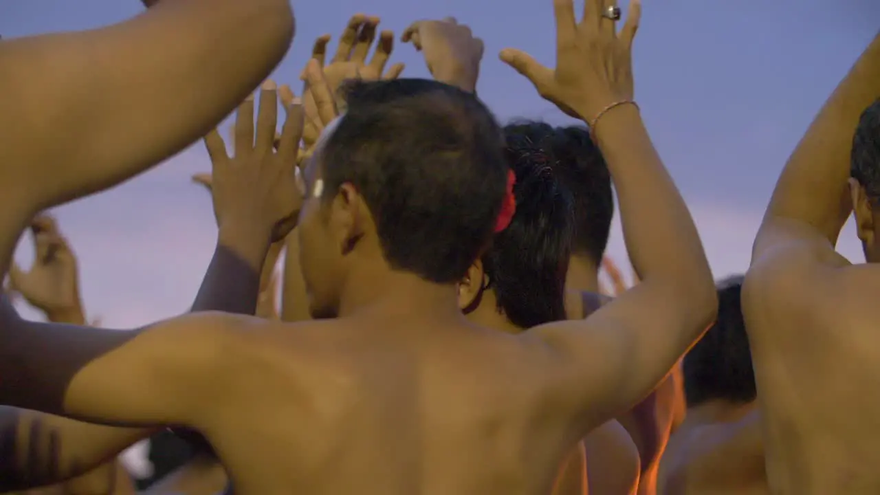 Men Dancing and Chanting the Kecak at Dusk