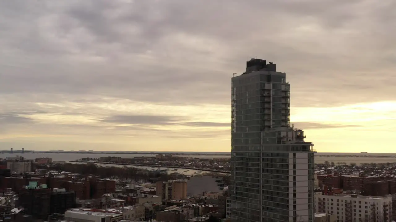 An aerial view of an apartment building in Brooklyn on a cloudy day in the winter