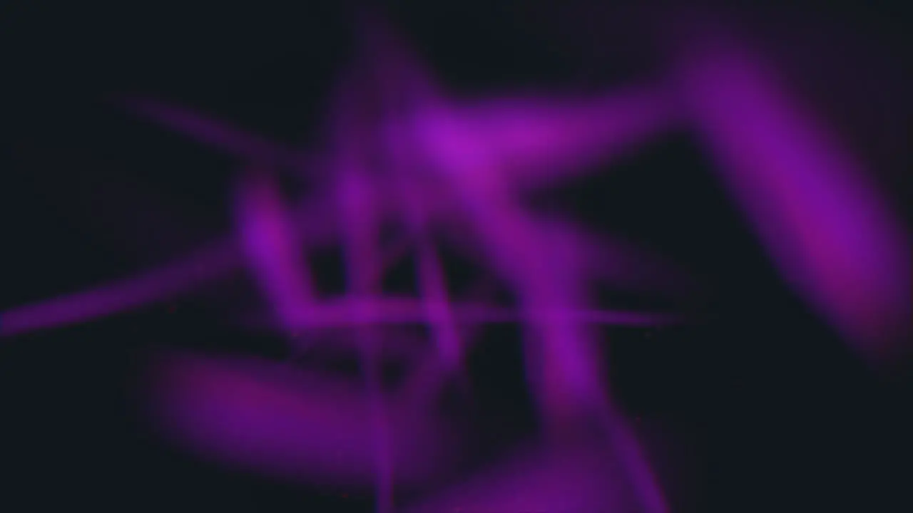 Purple glowing lines in dark space