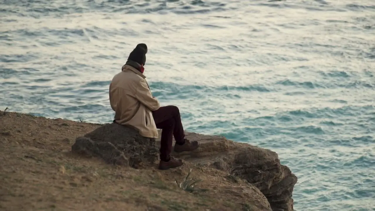 Slow Motion Of Man Watching Sunset In Beautiful Sea View Cadiz Spain