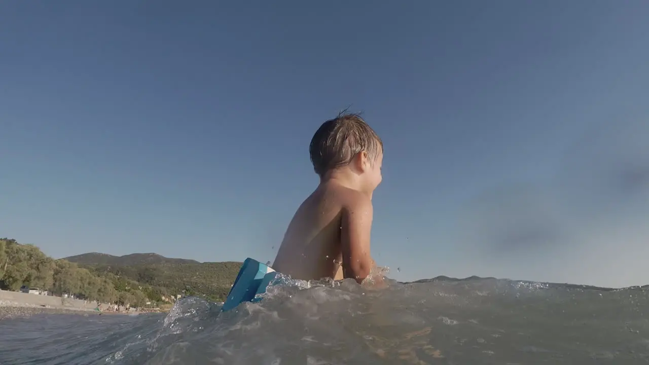 Footage of Two Years Old Boy Playing With Waves At Santova Beach Kalamata Greece