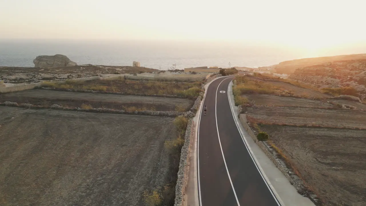 Aerial footage of Male Runner Jogging in the nature