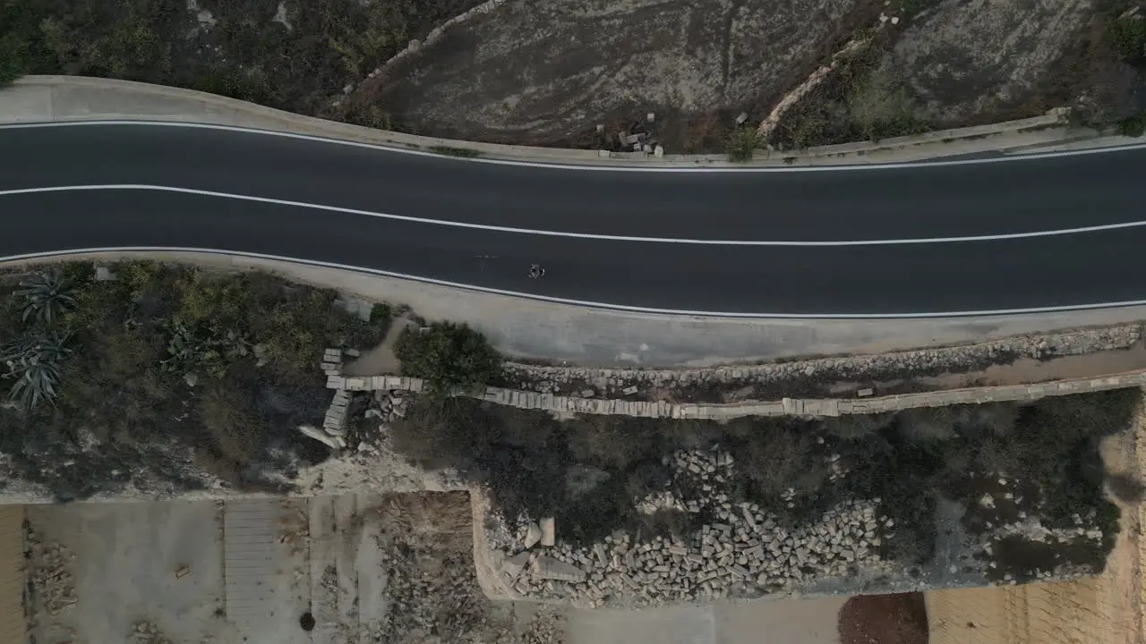 Aerial Top down View Of A Man Running Across the country