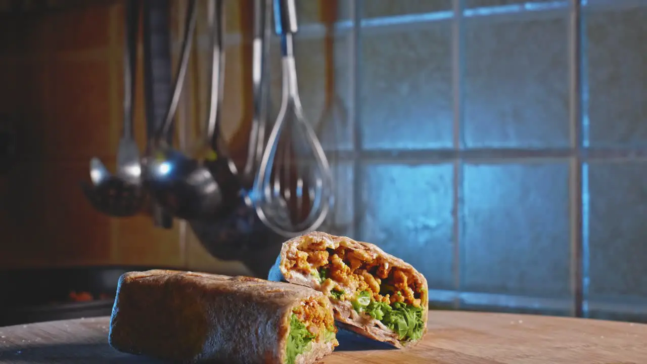 View In The Kitchen Of Prepared Tortilla Wrap With Ground Turkey And Broccoli