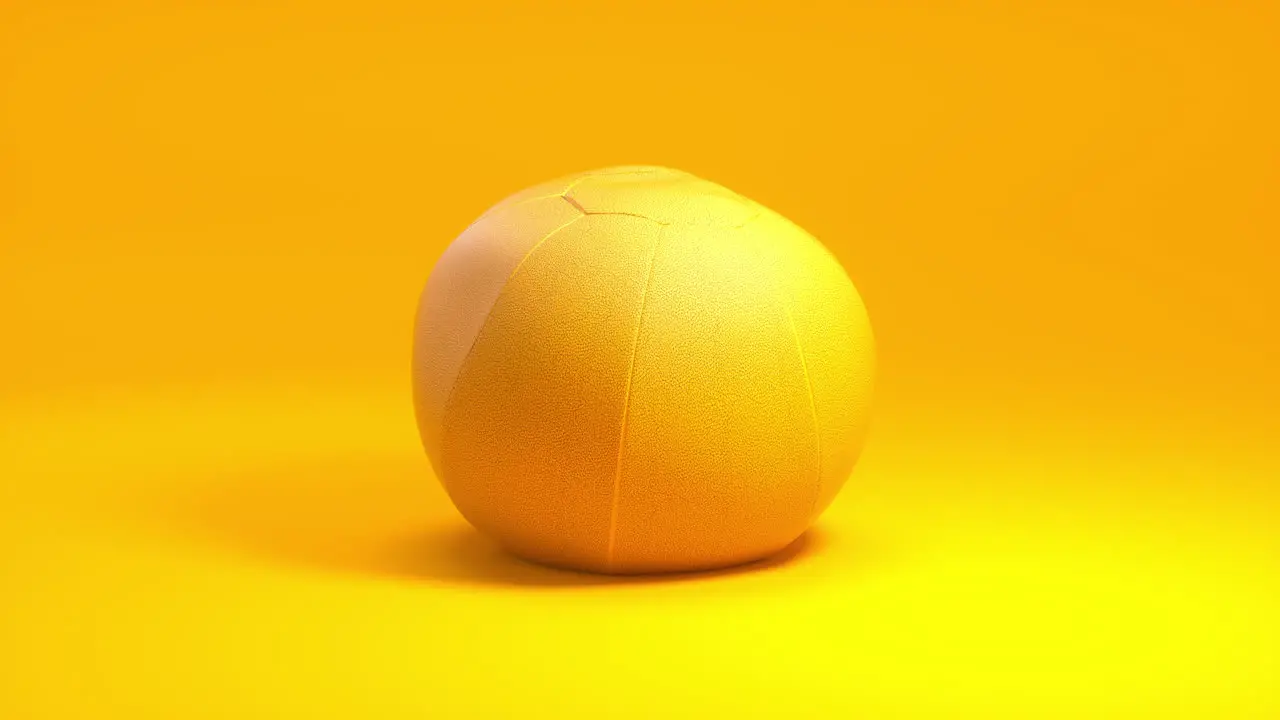 Dynamic 3D Animation Yellow medicine ball rotates against a clean golden-yellow backdrop