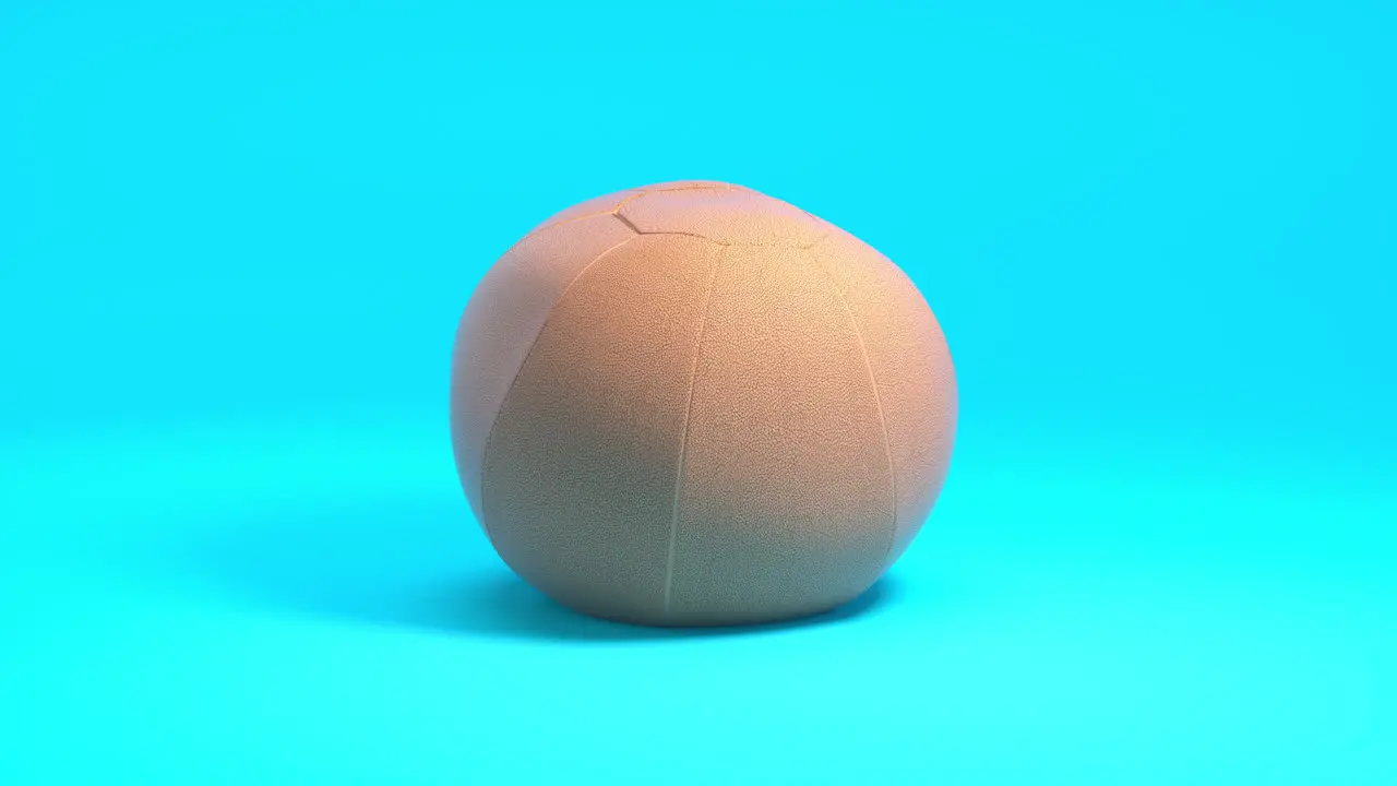 Sports 3D Animation photo realistic medicine ball rotates against a clean blue backdrop