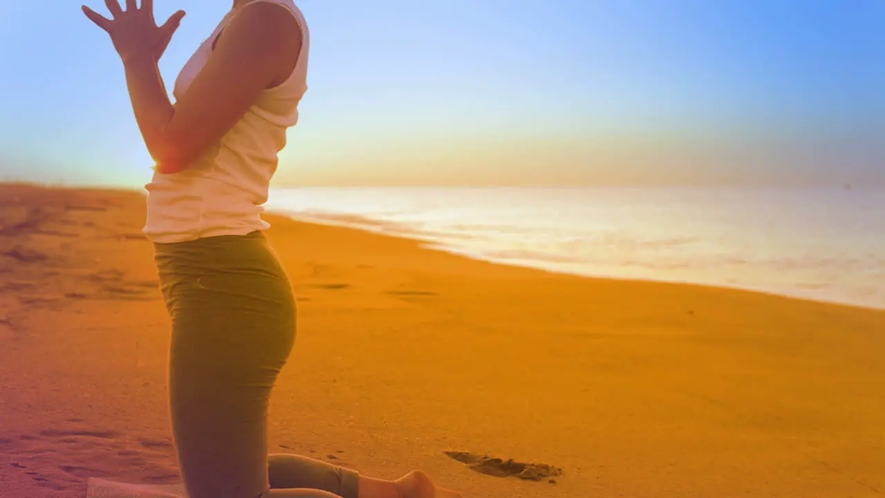 Woman Stretching on Beach 90