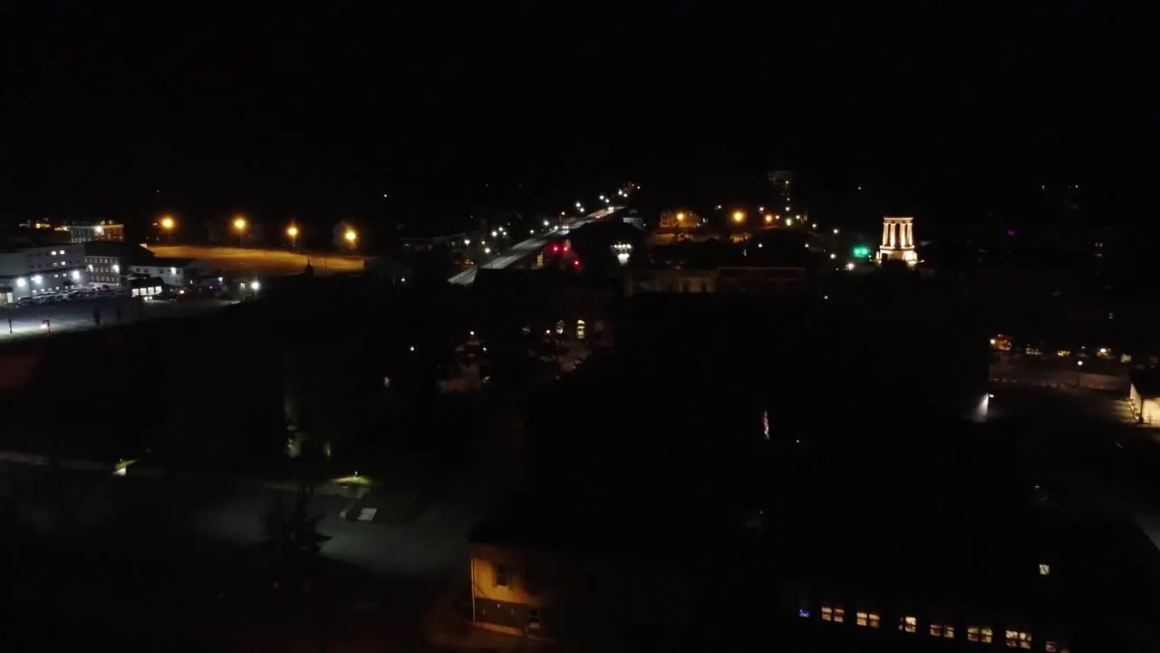 Pan in over downtown of a small town at night in Maine