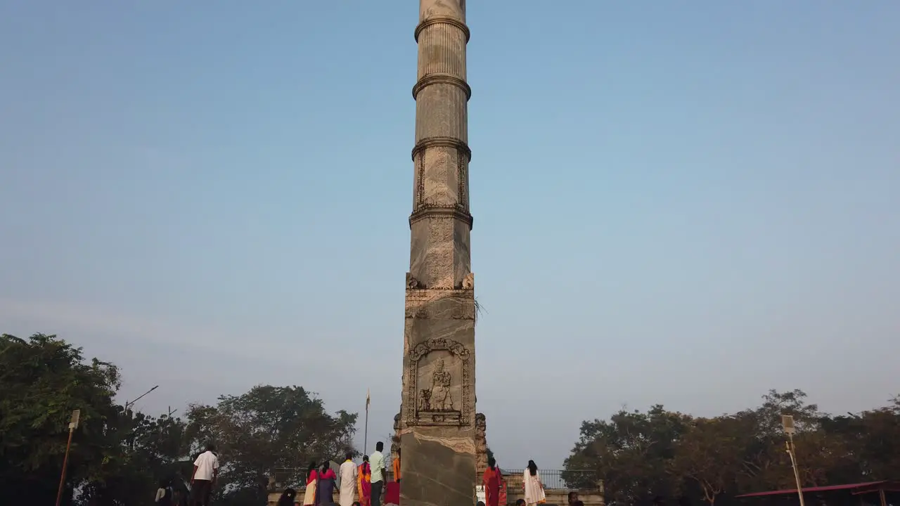 Piller Dhwaja Sthambam in front of the Bahubali statue