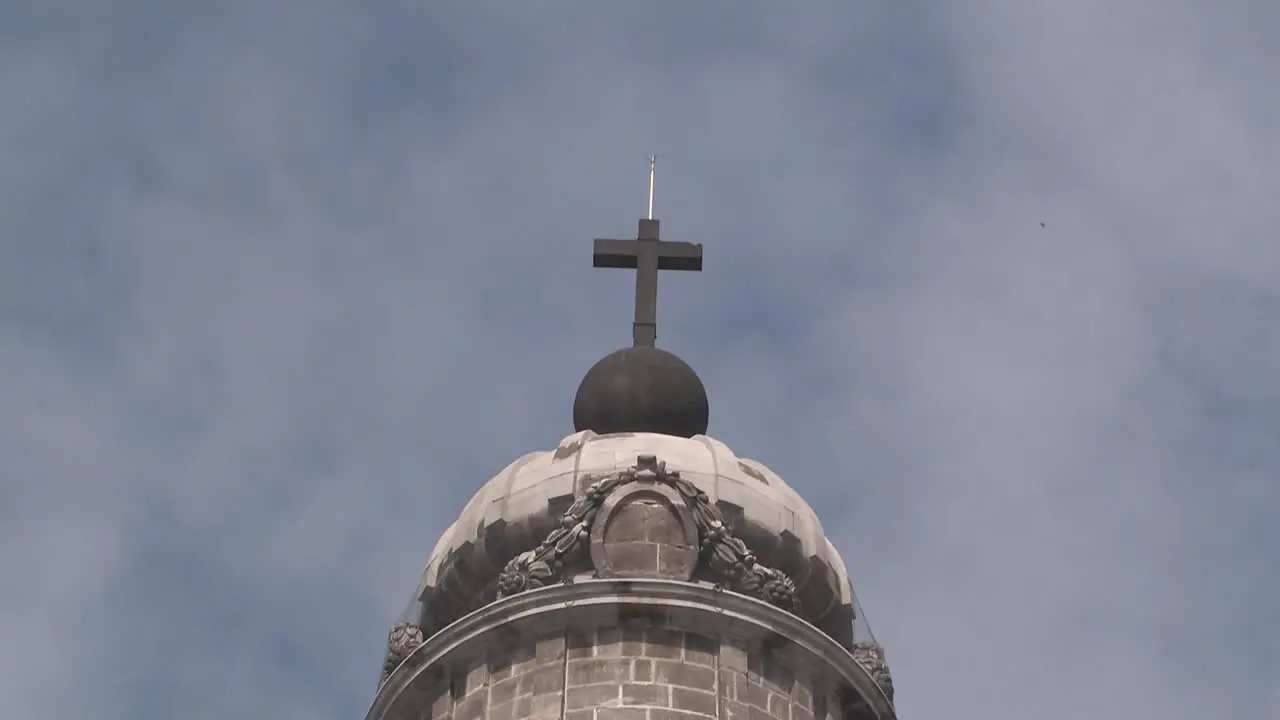 Top of tower with cross at Catedral Metropolitana da la Ciudad de Mexico