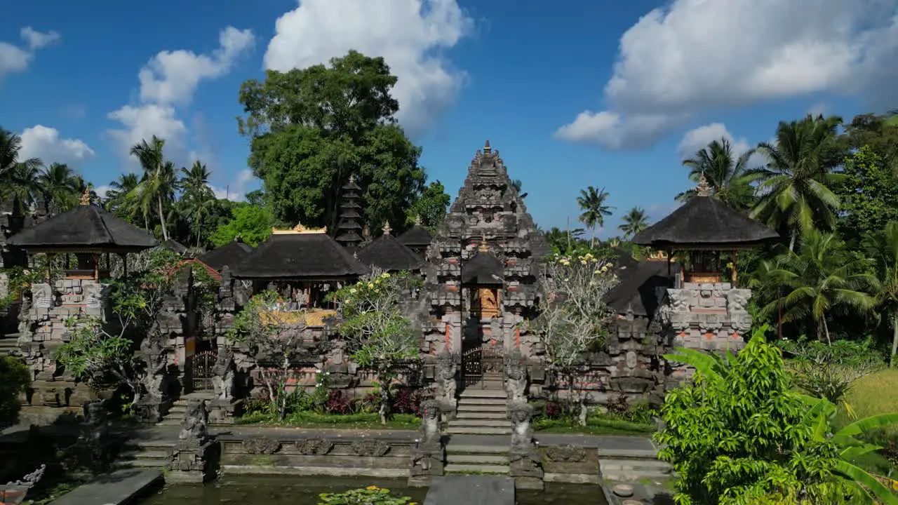 aerial view of a beautiful Balinese stone Temple in a sunny blu sky day Ubud Bali Indonesia