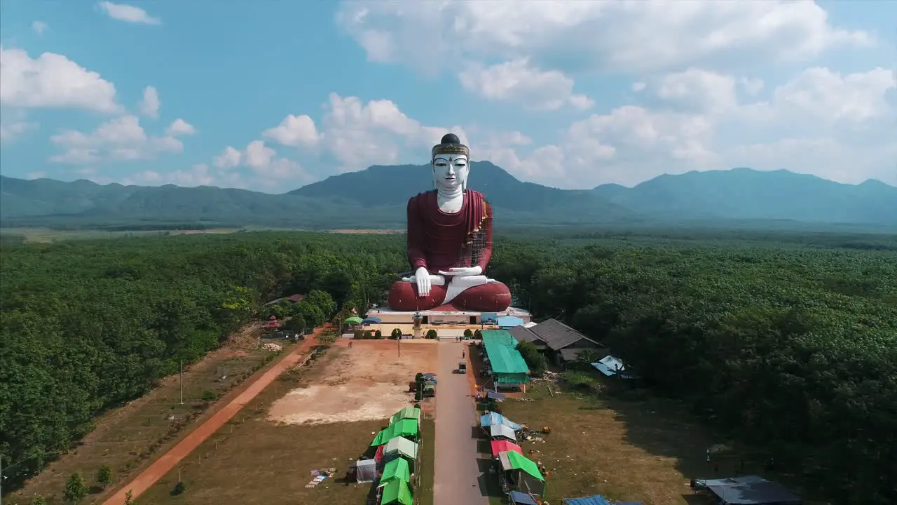 Aerial Massive Buddha Statue Asia Countryside Pull Back Drone