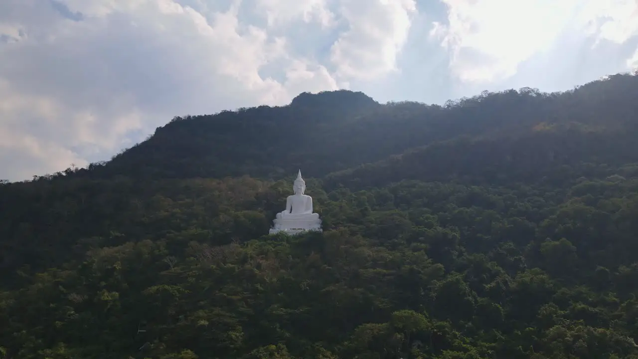 Luang Por Khao Wat Theppitak Punnaram a 4k footage towards this landmark of a Giant White Buddha Statue in Pak Chong Thailand