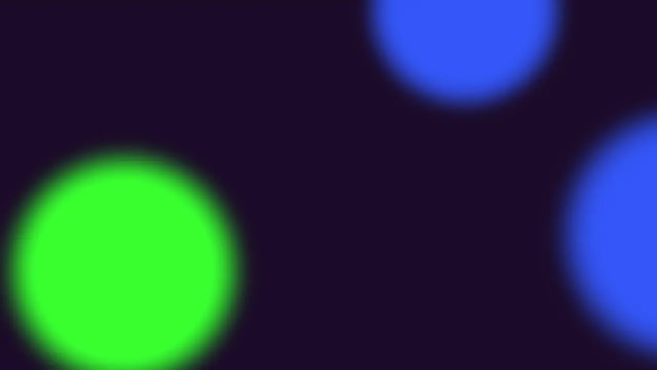 Neon blue and green circles in dark space