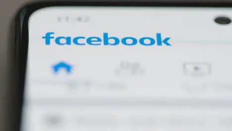 Close Up Tracking Shot Messenger to Facebook Logo on Phone