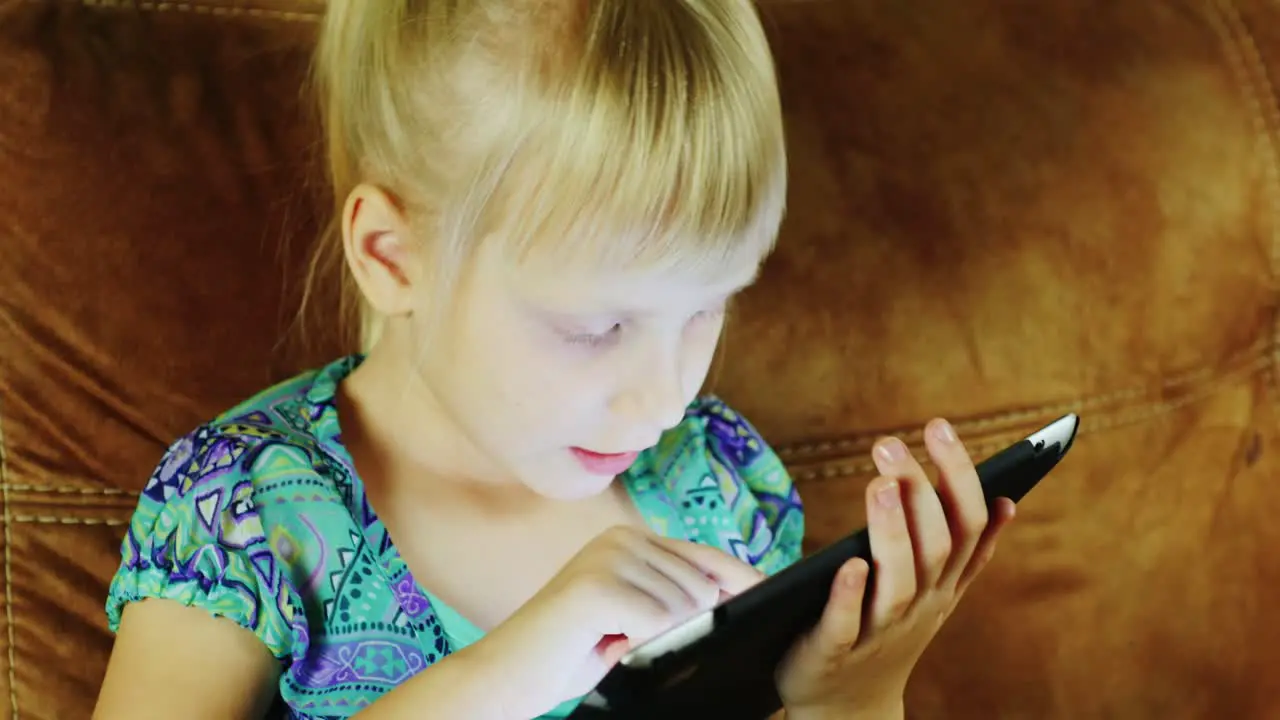 Young Caucasian Girl Using A Tablet 02