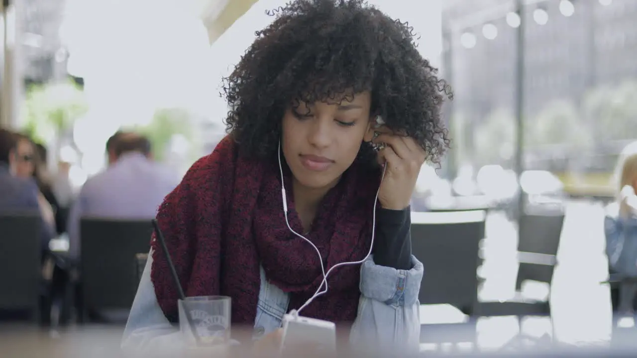 Young woman listening to music