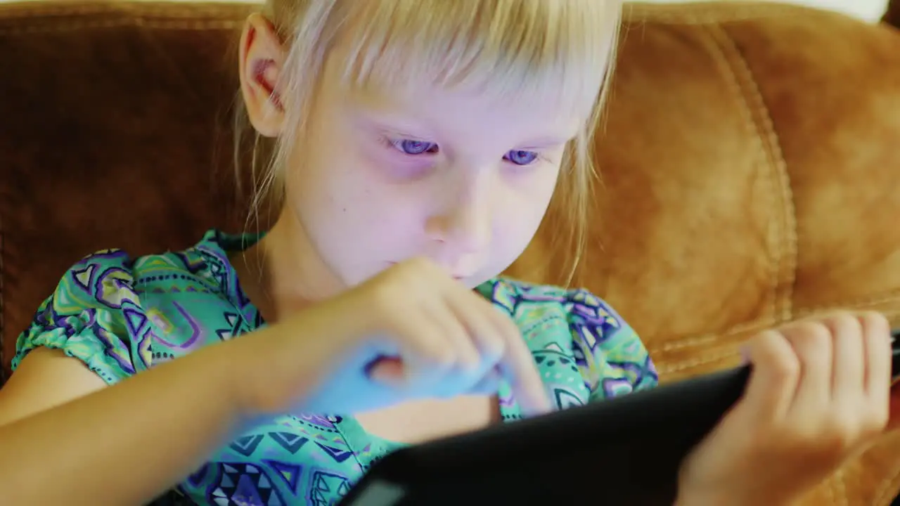 Young Caucasian Girl Using A Tablet 06