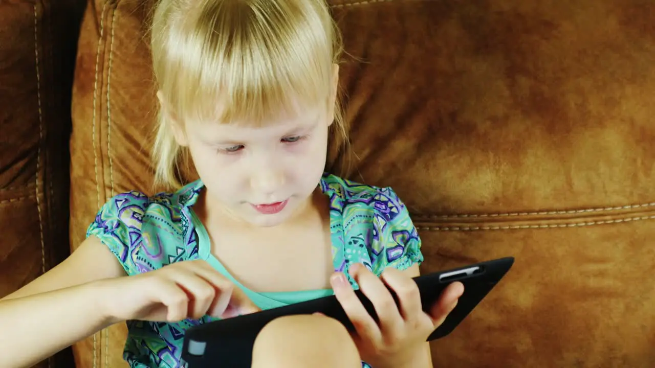 Young Caucasian Girl Using A Tablet 01