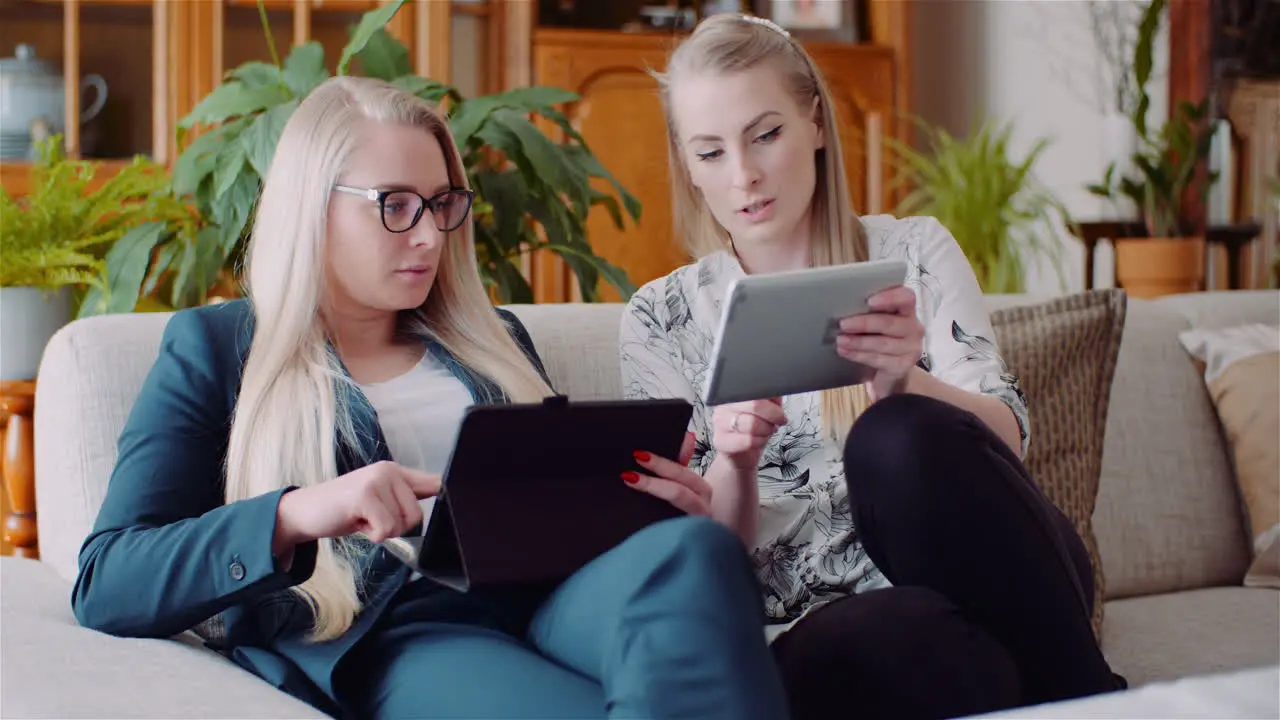 Businesswomen Discussing Over Technologies In Office Businesswomen Working On Digital Tablet 6