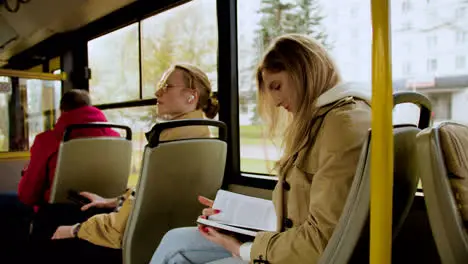 Young people sitting in the bus