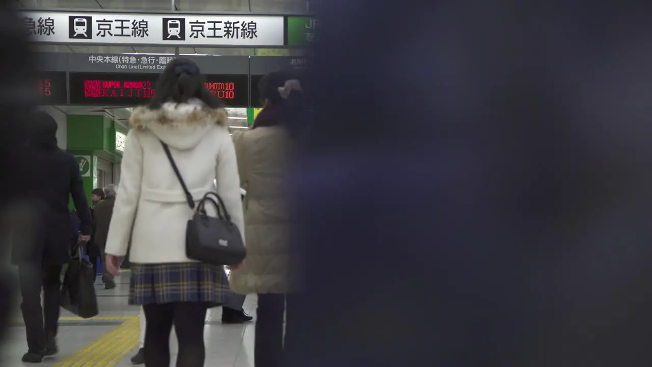 Crowds Moving Through Shinjuku Station Tokyo