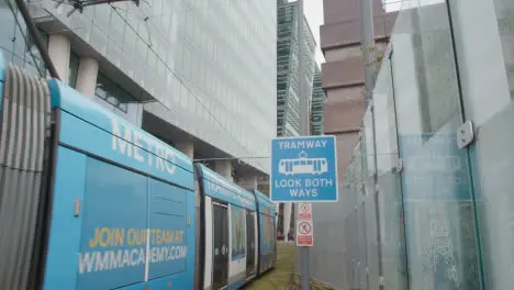 Tramway Warning Sign With Tram In Birmingham UK