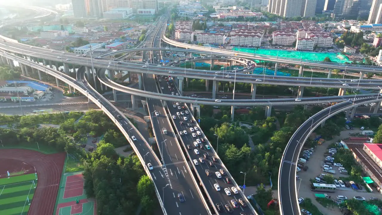 Aerial photography of urban transportation roads Aerial vehicle driving on urban overpass Busy urban transportation Aerial photography of crisscrossing urban overpasses