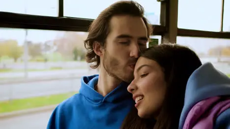 Close up view of a couple talking in the bus