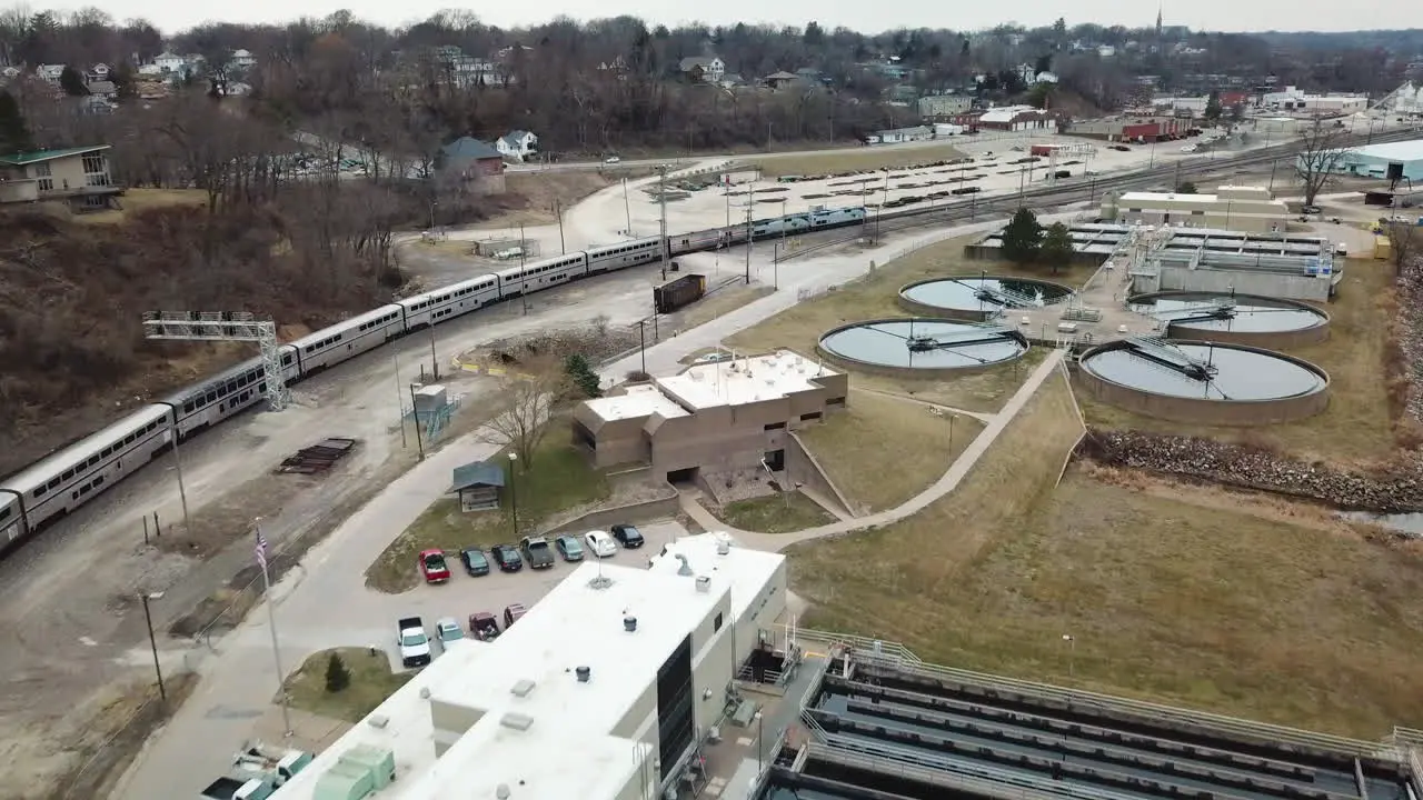 Aerial of the Southwest Chief Amtrak train traveling through a railroad yard near Burlington Iowa