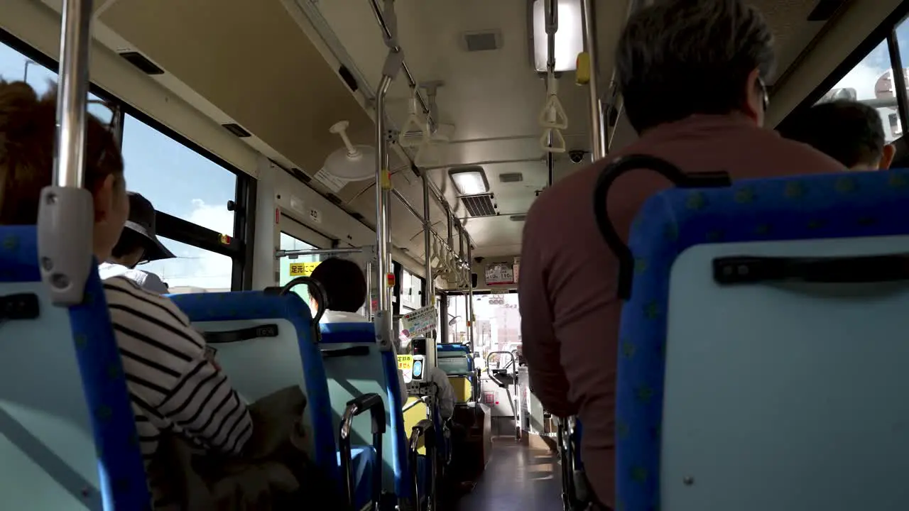 Inside local bus japanese people enjoy ride in modern bus transport system of Toyama Japan