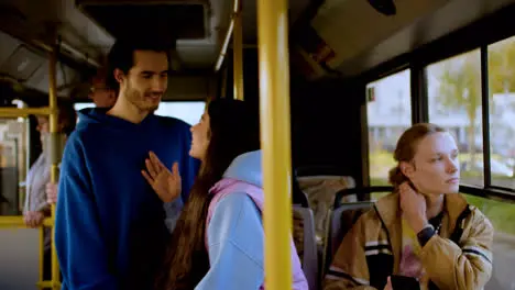 Couple talking in the bus