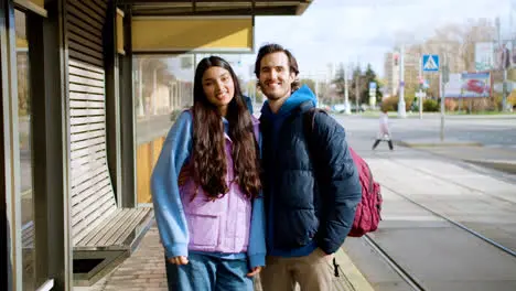 Couple at bus stop