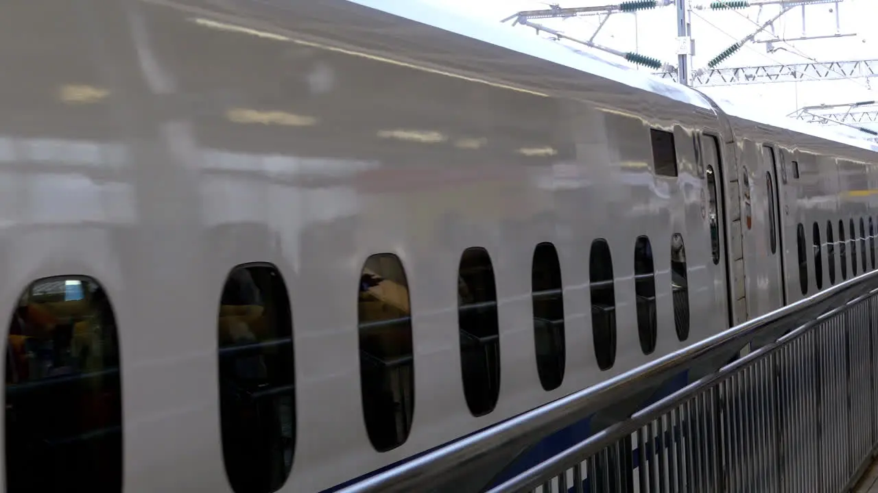 Shinkansen in train station slow approach Japan