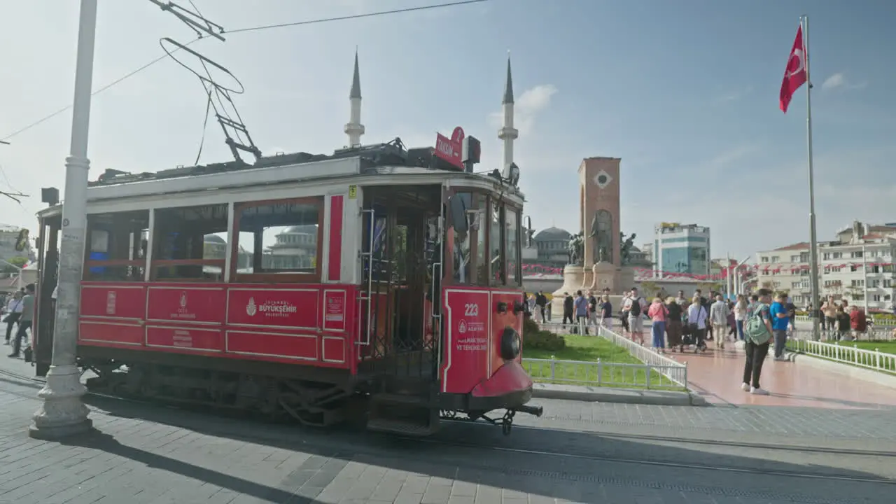 Nostalgic public electric red tram at Taksim square terminus Istanbul